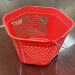 Red hexagon with vented holes. Red hexagon with vented holes.