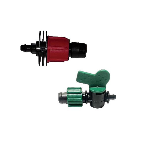 These are 1/4" barbed irrigation tape fittings by Toro and Irritec.